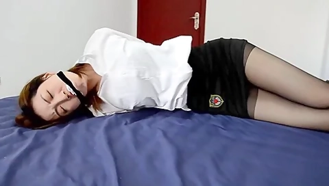 Asian Woman Taped Up