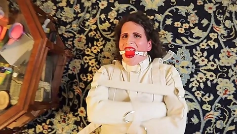Struggling In A Straitjacket And Ankle Restraints
